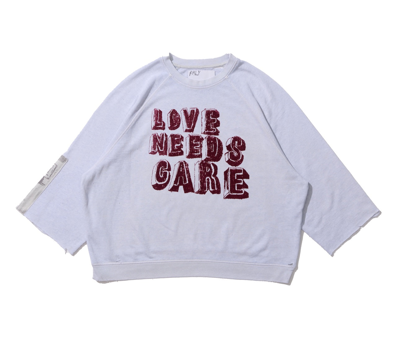 LOVE NEEDS CARE CREWNECK - Paly Hollywood