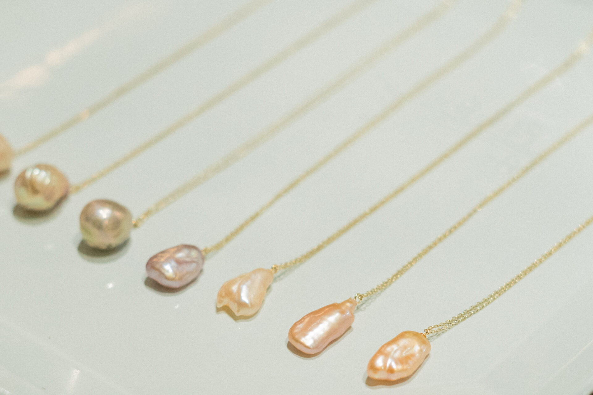 虹色の輝きを放つびわ湖真珠「JINBO PEARLS」- 巡る滋賀