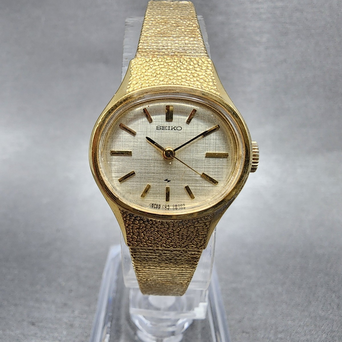 Seiko Watch Women 22mm Champagne Dial Gold Tone Oval Manual 1104