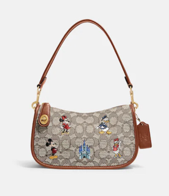 ❤️Coach Disney X Coach Swinger Bag In Signature Textile Jacquard