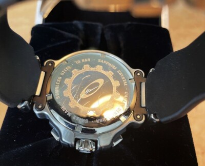 OAKLEY Crankcase Stainless Red dial Chronograph watch battery runs