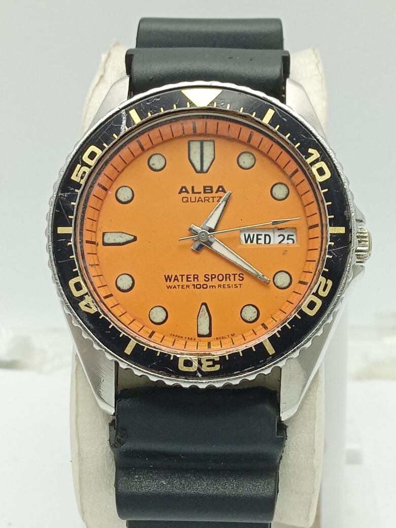 Seiko Alba Y563-601A Quartz Orange Dial Vintage Men's Watch