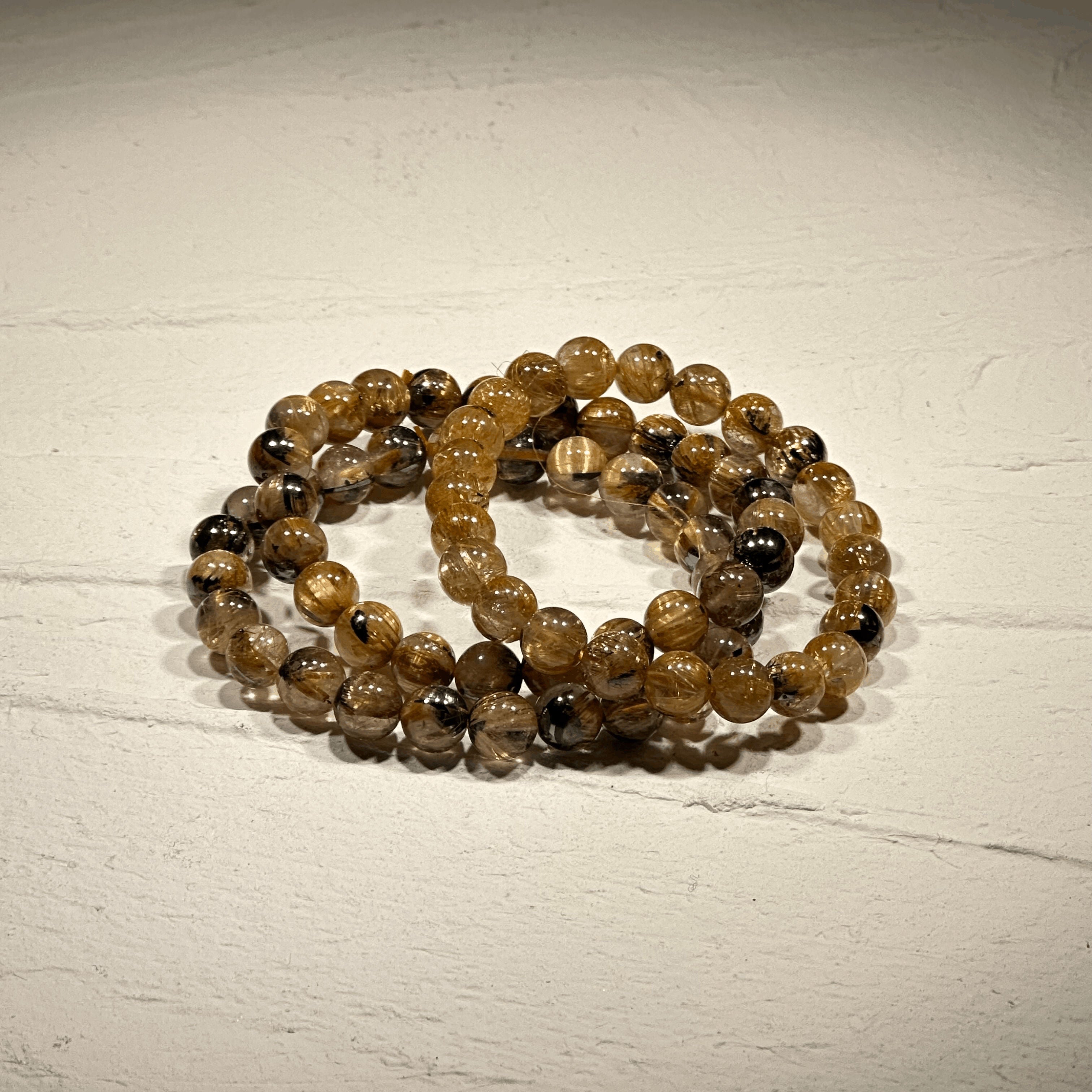 太陽放射ルチルクォーツ - ブレスレット6.5mm〜7.4mm - 金運