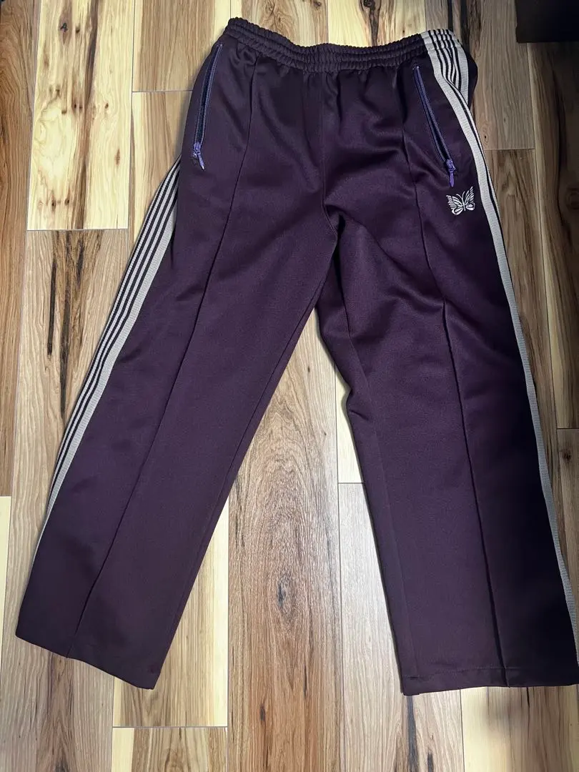 2026年最新】needles トラックパンツ マルーンの人気アイテム - メルカリ