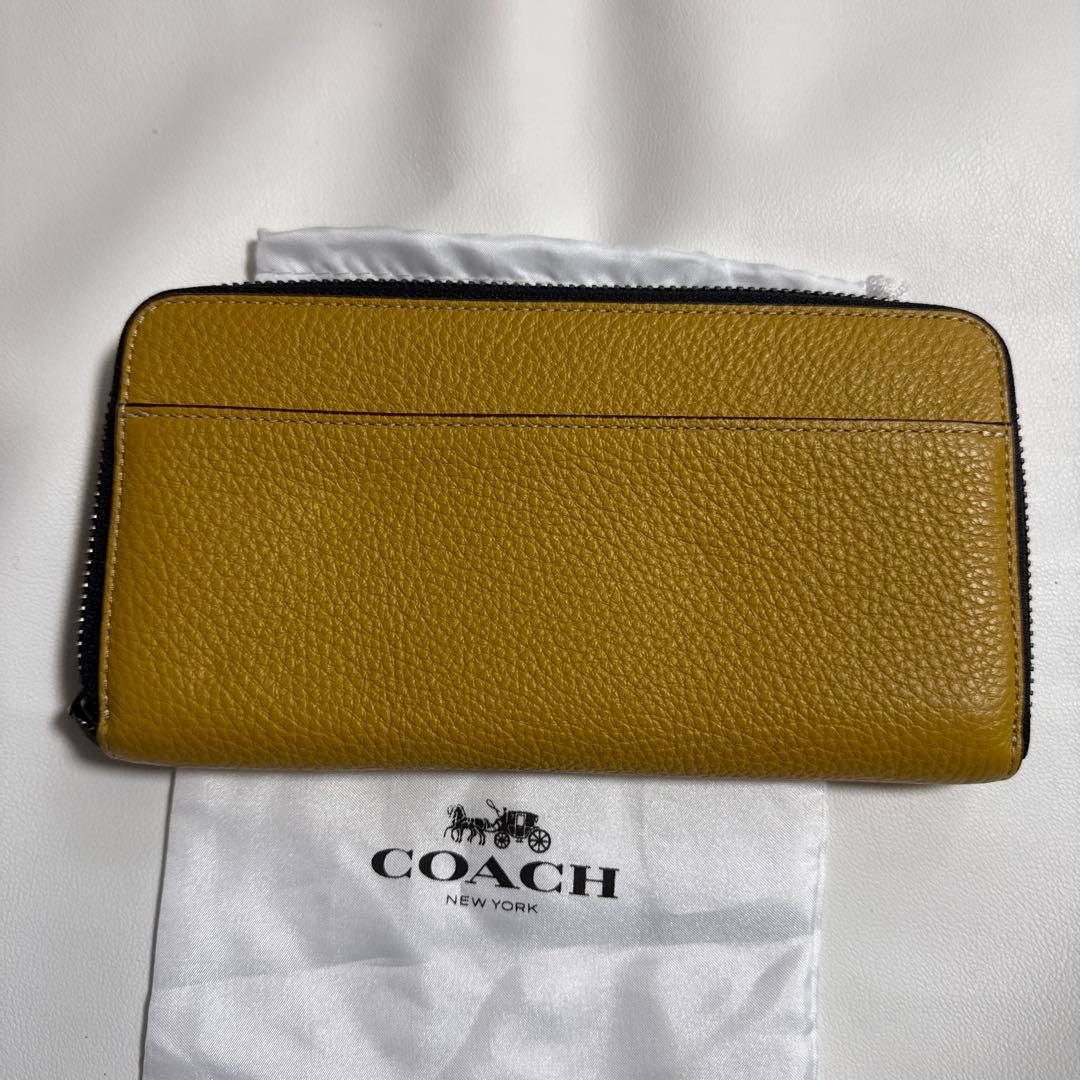 COACH スヌーピー 長財布 イエロー - メルカリ