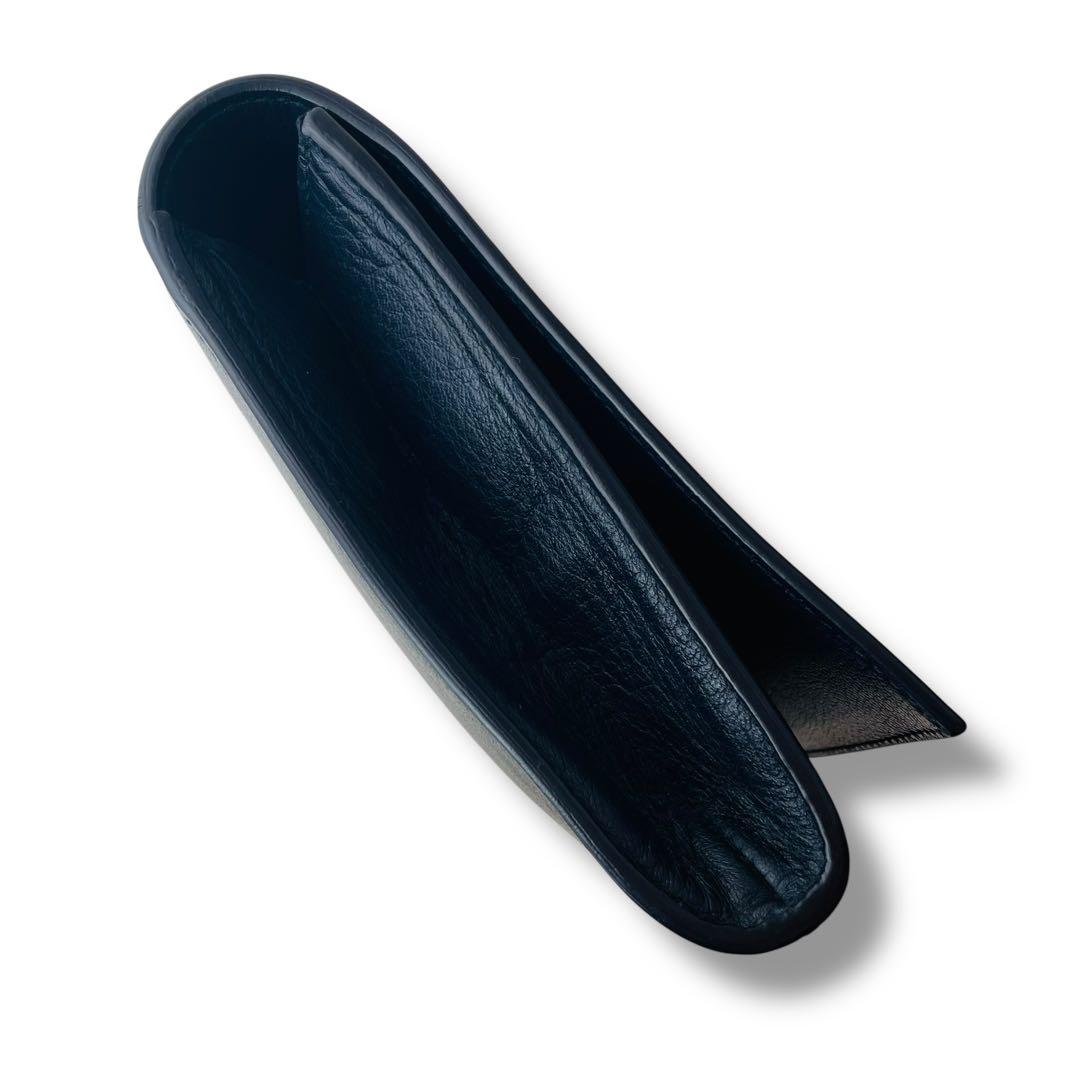 美品 濃紺 サンローラン クラッチバッグ カサンドラ ロゴステッチ