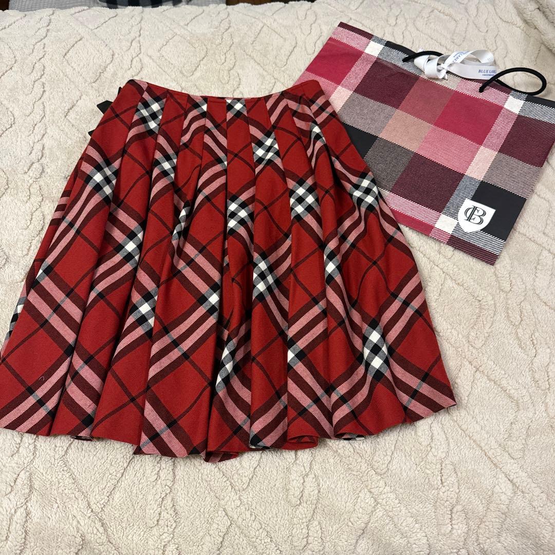 バーバリーブルーレーベル赤チェックベルト付き巻きスカート - メルカリ