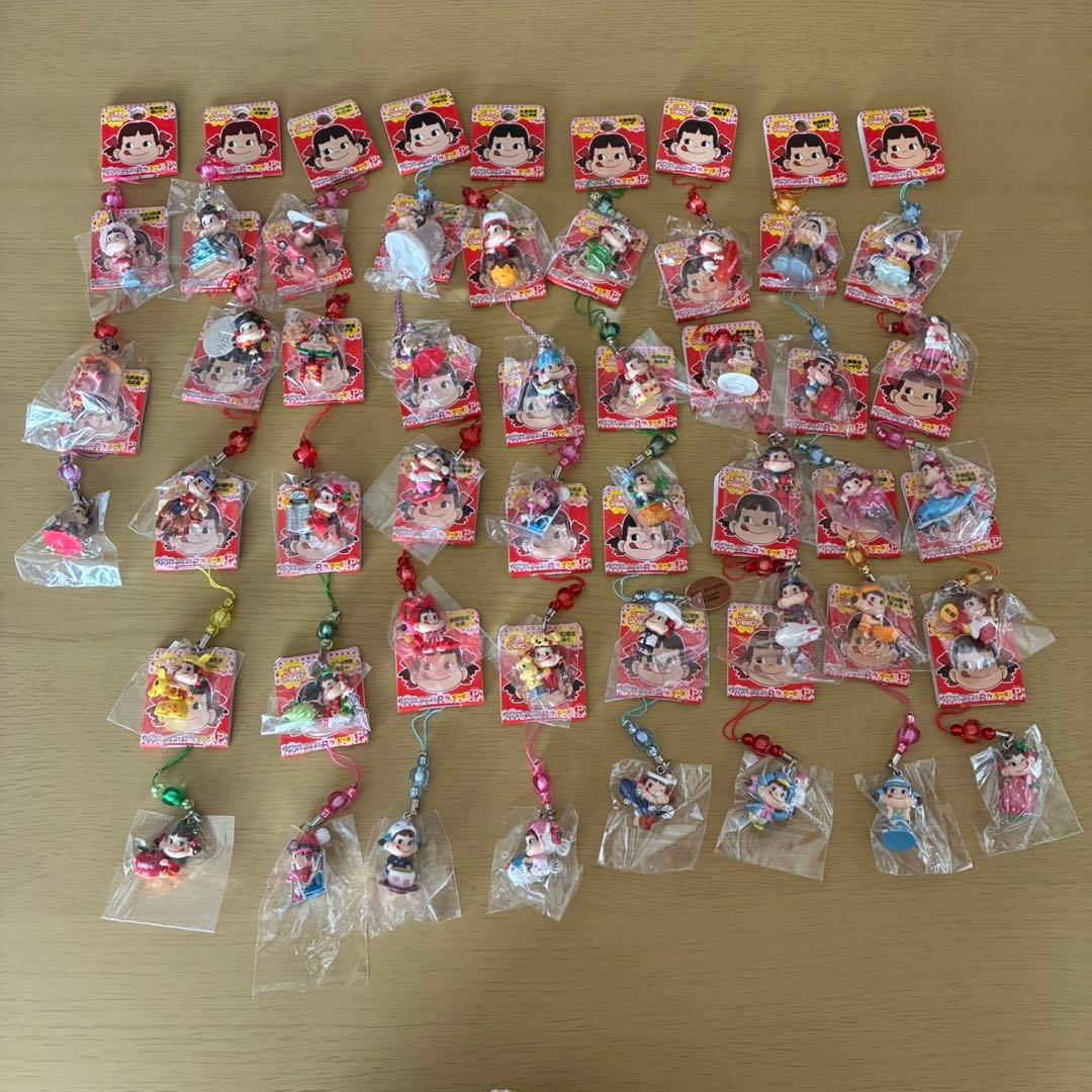 【新品未開封】ペコちゃん　43個セット　ご当地　ストラップ　キーホルダー Amazon.co.jp: 不二家 ペコちゃん ご当地キーホルダー 大阪たこ焼き