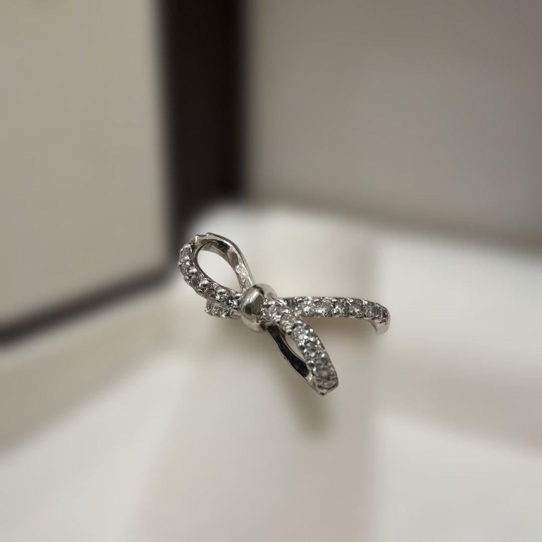 ダイヤモンド リボン ピンキーリング 3号 プラチナ - メルカリ