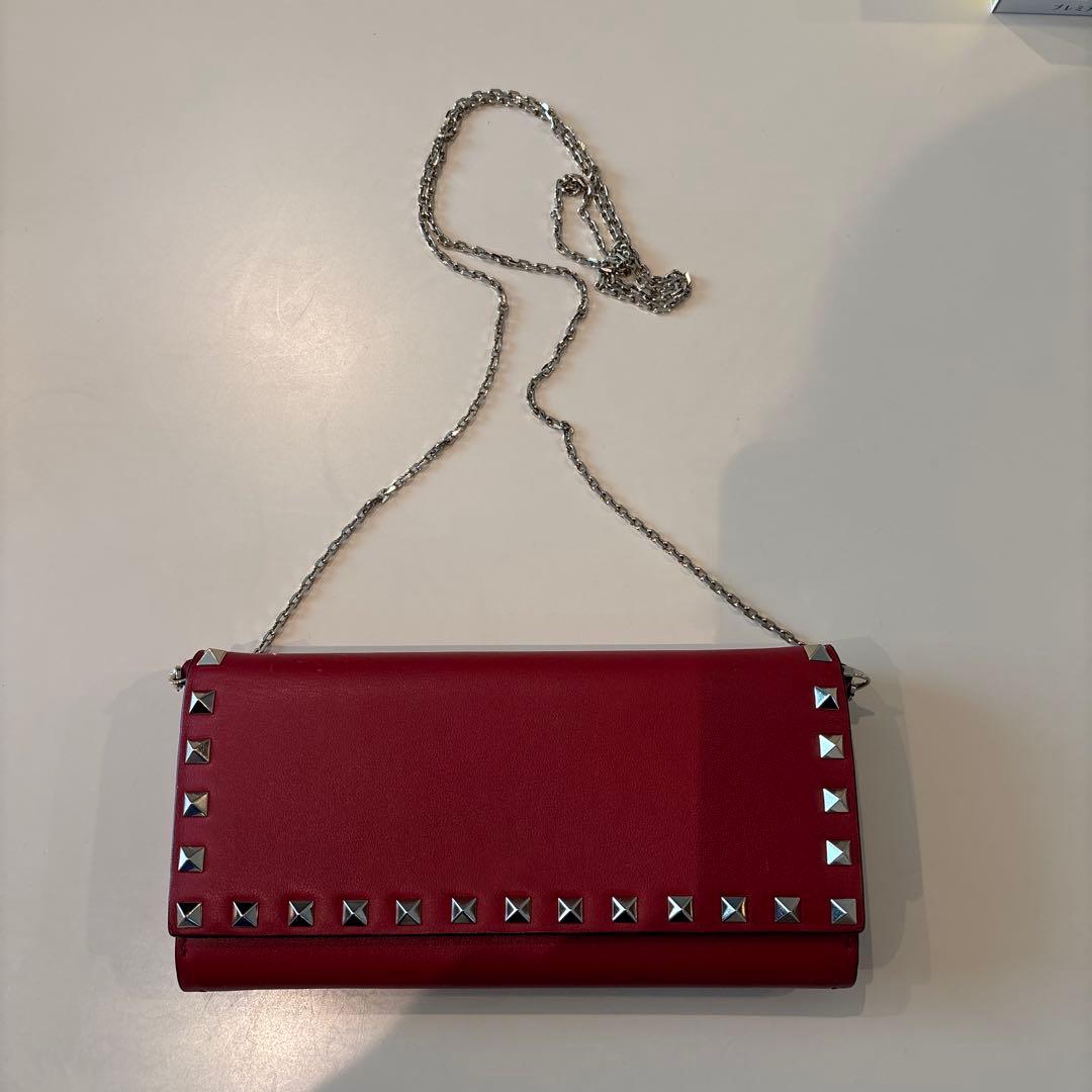 VALENTINO スタッズ付きクラッチバッグ レッド - メルカリ