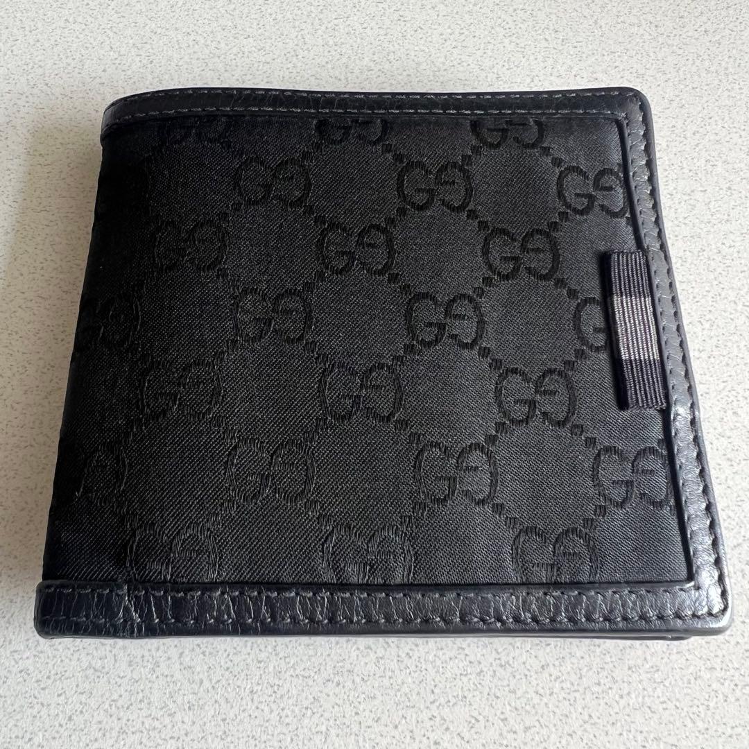 Gucci GGパターン ブラックレザー 二つ折り財布 - メルカリ