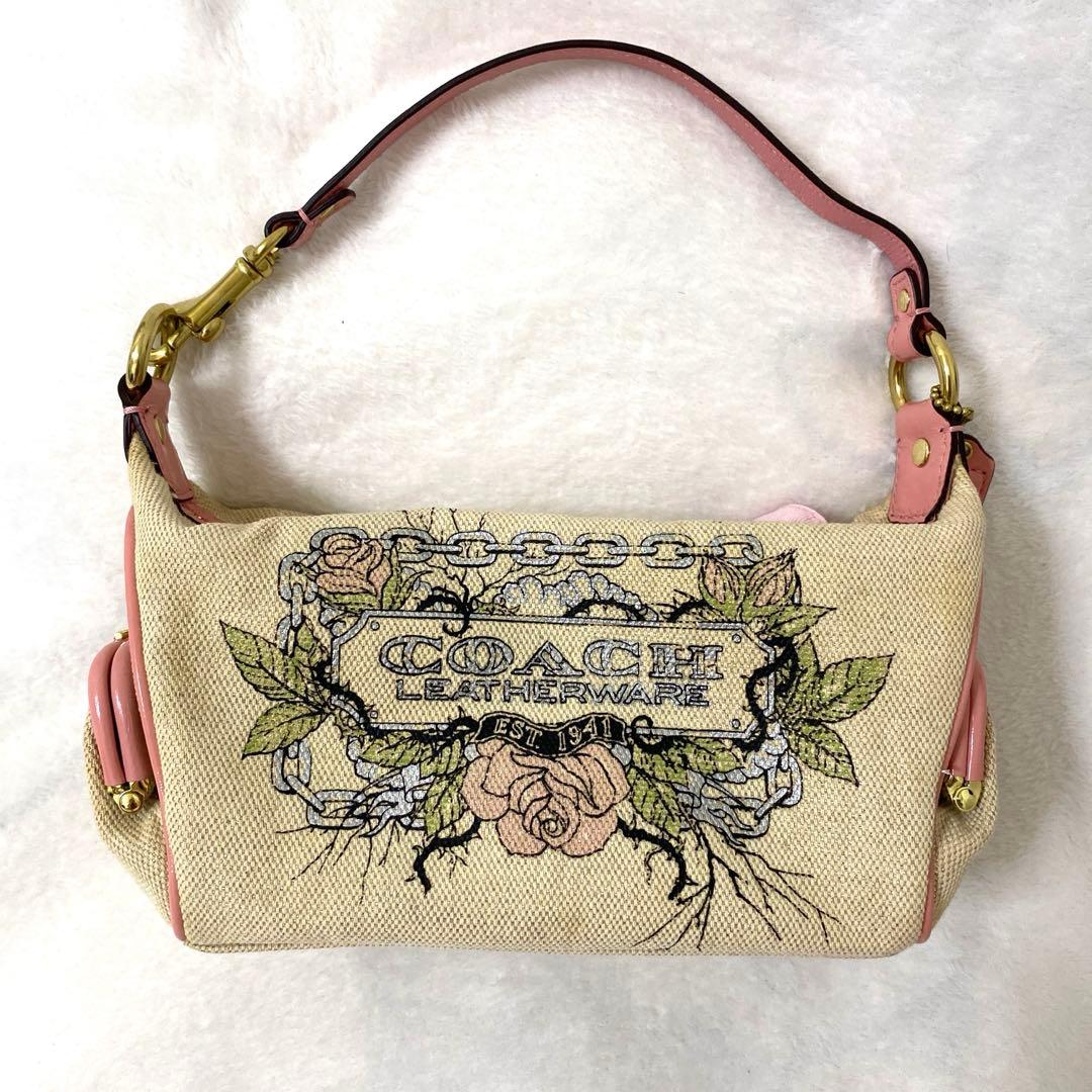 美品‼︎】COACH キャンバスタトゥー アクセサリーポーチ - メルカリ