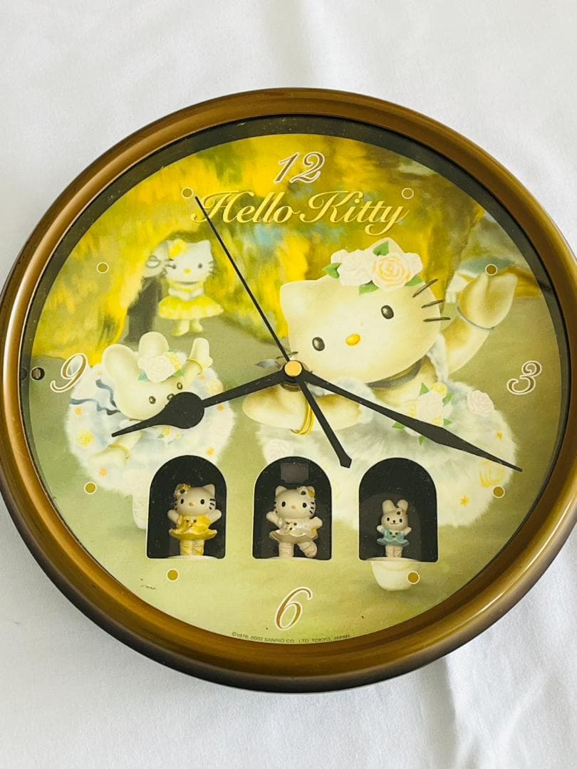 □ハローキティ からくり時計 バレリーナ 掛け時計 直径26cm - メルカリ