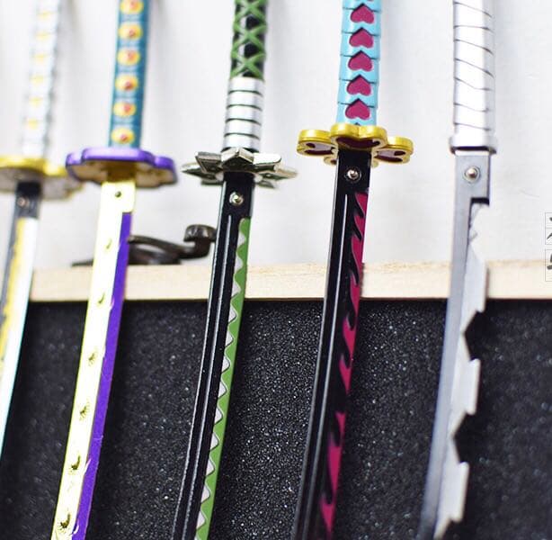 鬼滅の刃 日輪刀キーホルダー 黒死牟 - メルカリ