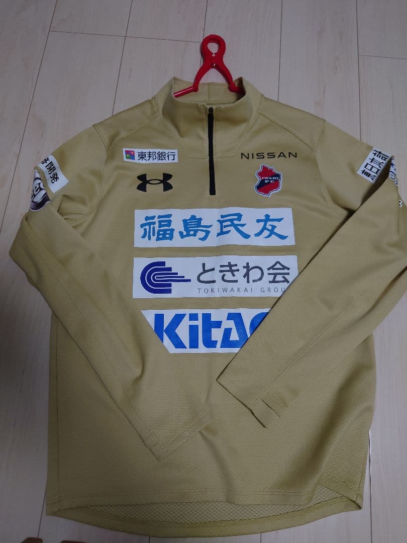 太*郎様 いわきFC Under Armour ハーフジップシャツ ベージュ　ト HALF ZIP UP PULLOVER ハーフ ジップ アップ プルオーバー｜サンド