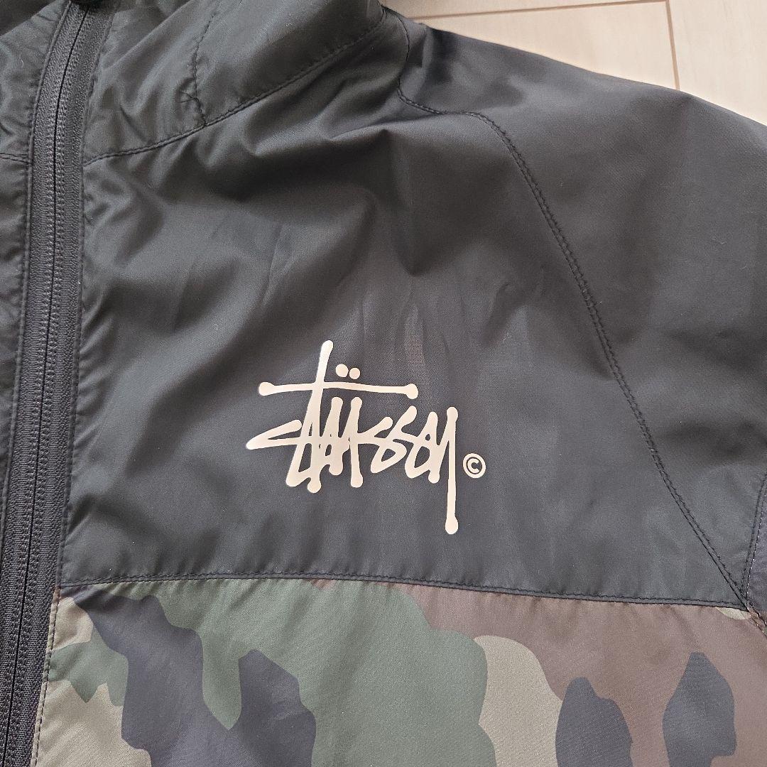 Stussy 迷彩 フード付きナイロンジャケット - メルカリ