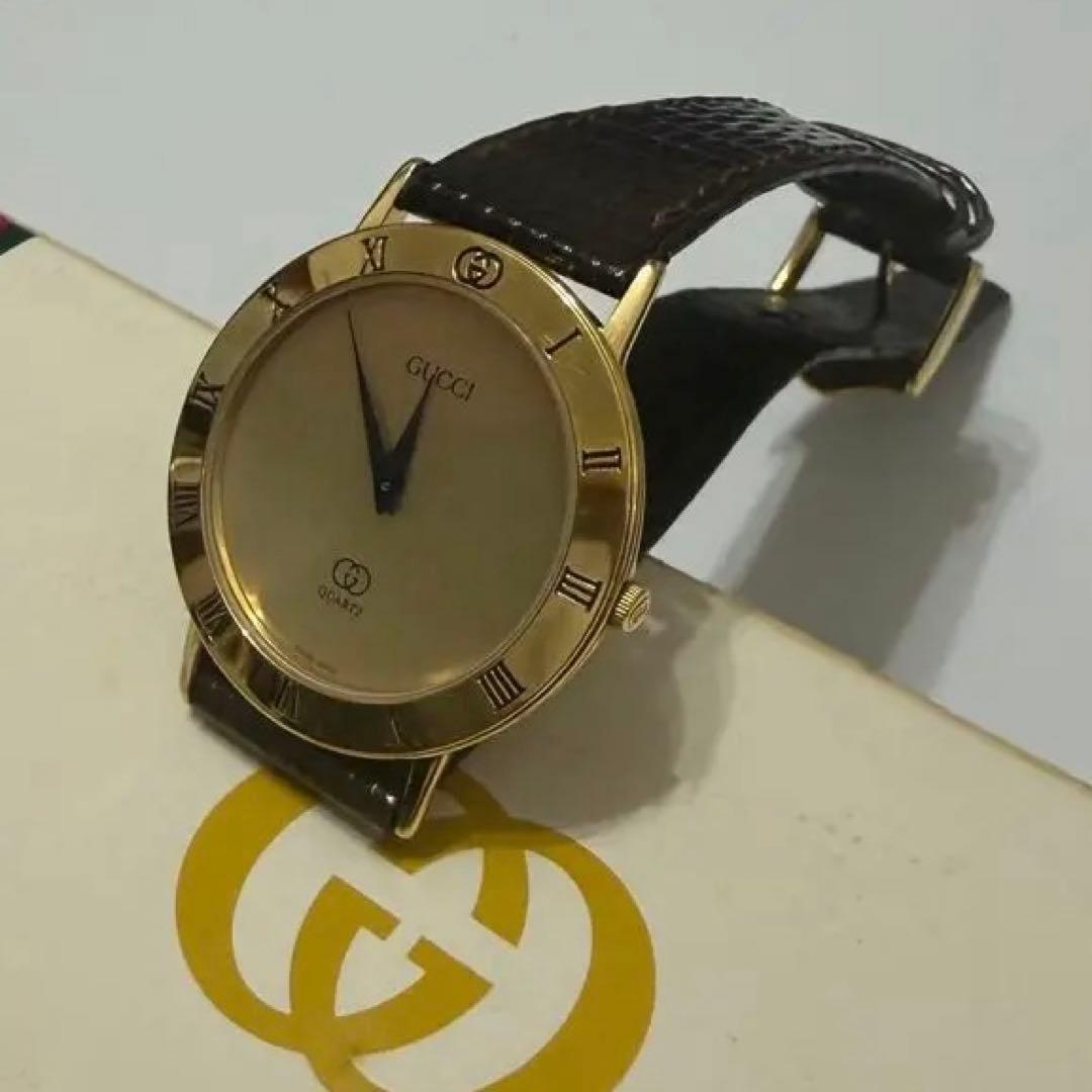 GUCCI ゴールド アナログクォーツ腕時計 - メルカリ