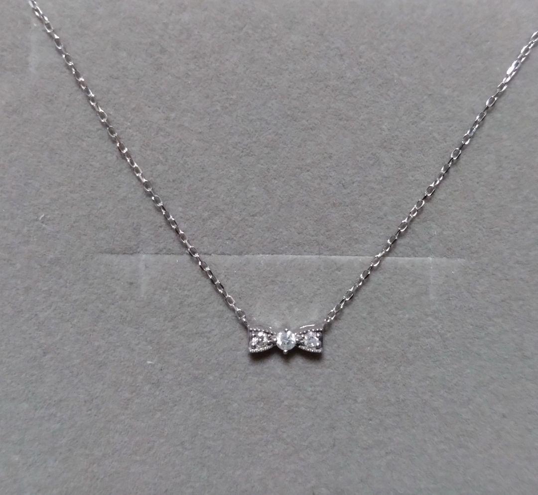 ジュエリーツツミ K10ホワイトゴールドリボン型ネックレス ジュエリーツツミ K10ホワイトゴールドダイヤモンドネックレス