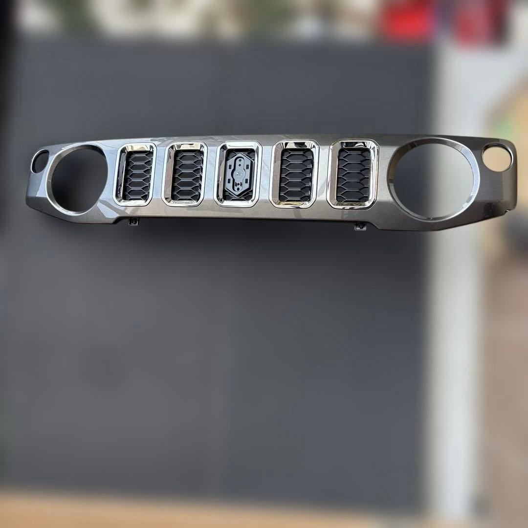 JC74W ジムニーノマド 純正フロントグリル 新車外し マークレス - メルカリ