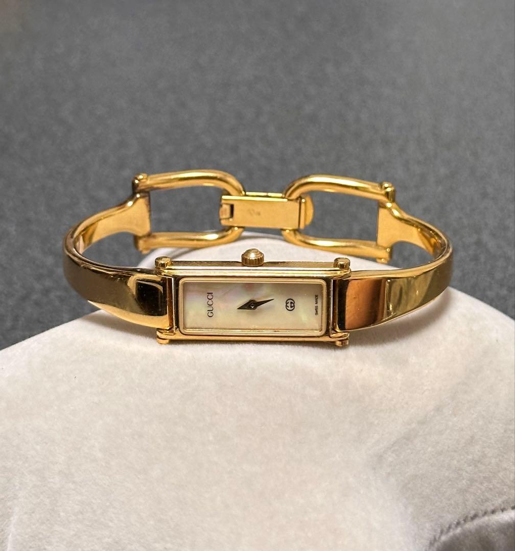 GUCCI グッチ 時計 1500L ゴールドバングル 螺鈿文字盤 - メルカリ