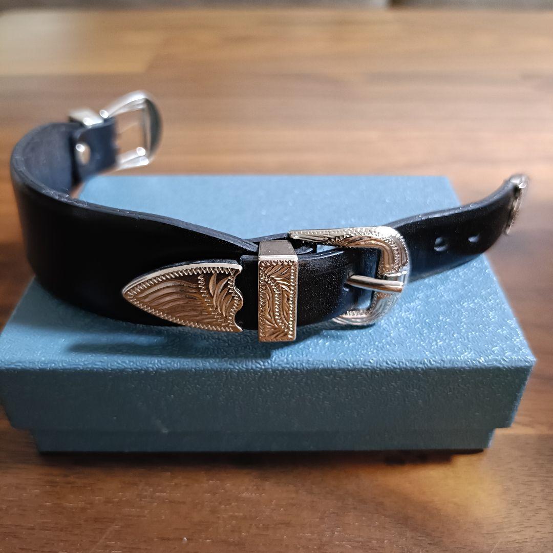 TOGA DOUBLE BUCKLE BANGLE ブラック TOGA TOO トーガ SS26 DOUBLE BUCKLE CONCHO BANGLE / BLK - NUBIAN