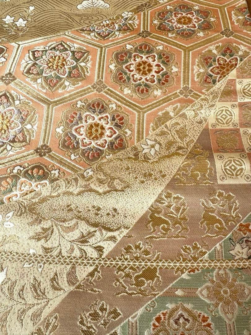 袋帯 花亀甲繋ぎと流水に古典草花文