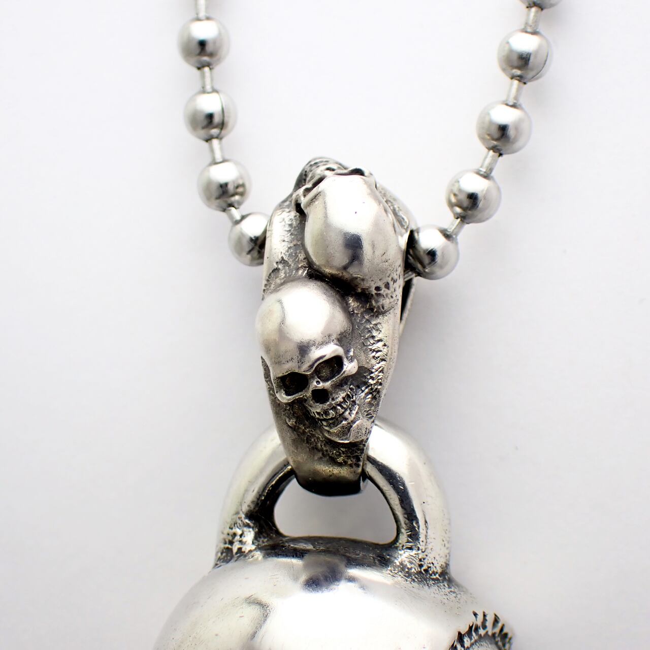 ツーフェイスドスカルペンダント ウィズアウトジョー』 ※ベイル