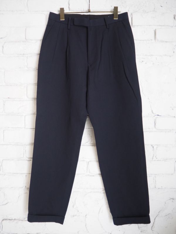 COMOLI ウールナイロン2タックパンツ